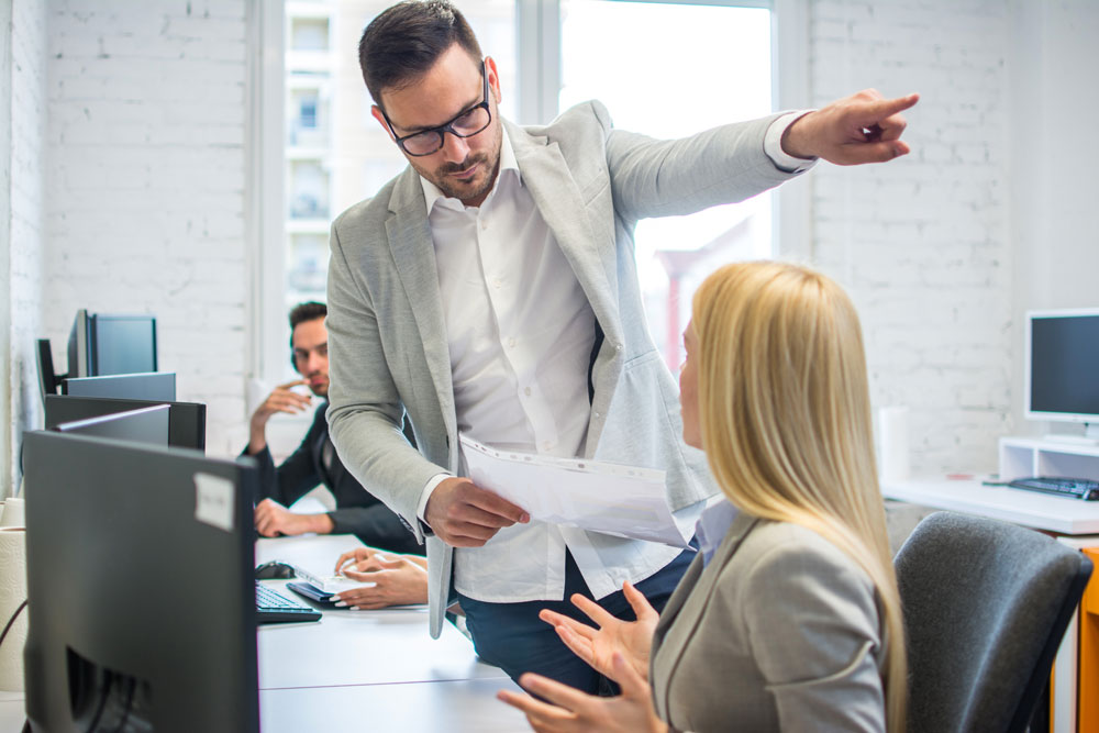 boss getting frustrated with employee
