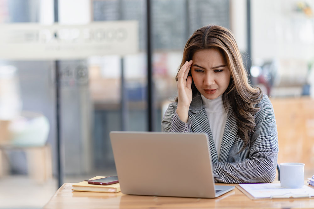 woman stressed out but can't give up