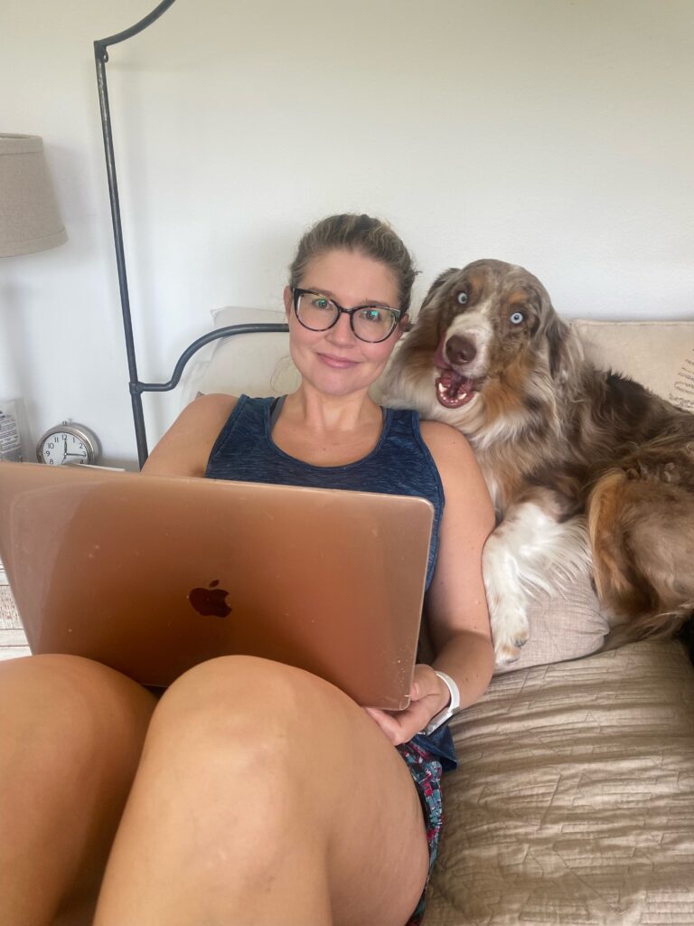 Resilience speaker Courtney Clark writing on her computer